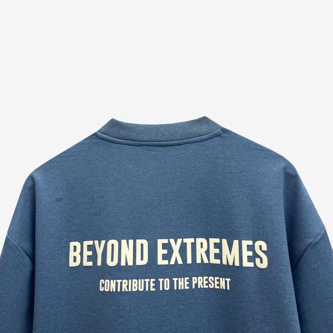 Oversized blue t-shirt from Beyond Extremes, showcasing luxury street style in Indian streetwear fashion.