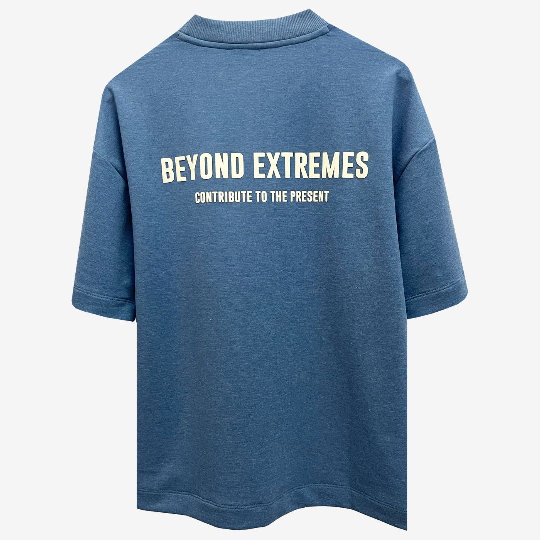 Oversized blue t-shirt from Beyond Extremes, showcasing luxury street style in Indian streetwear fashion.